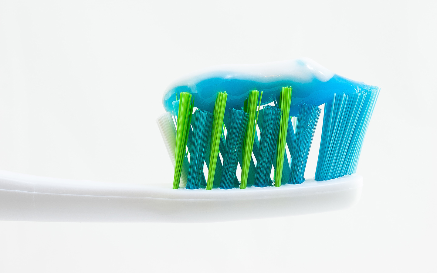 Closeup of toothbrush with toothpaste